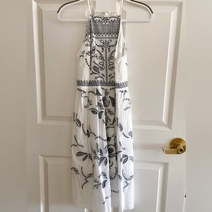 Stylish white cotton midi dress with hollow outs patterns